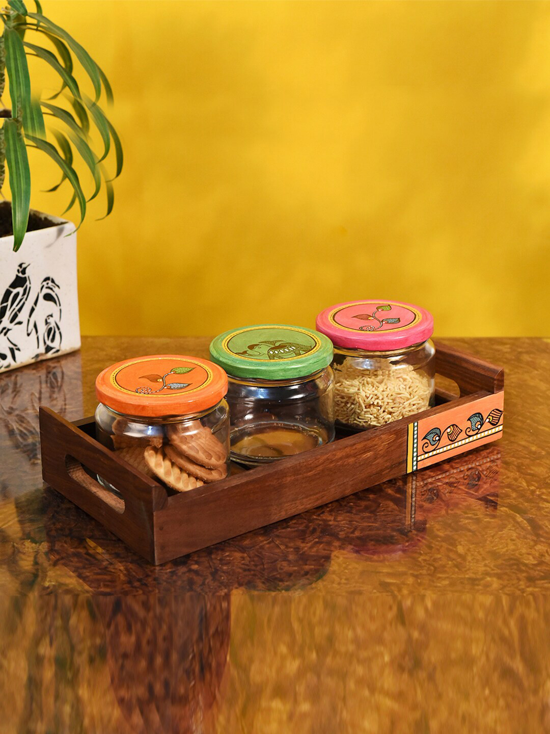 

AAKRITI ART CREATIONS Set Of 3 Glass Jars With Madhubani Painted Lid With Wooden Tray, Brown