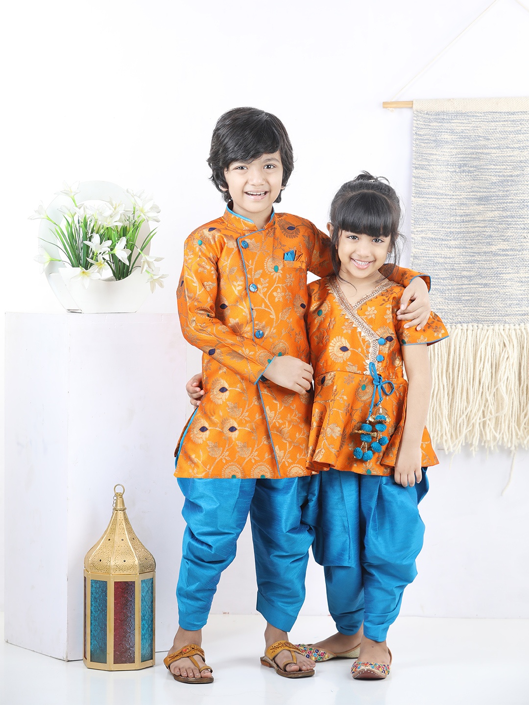 

BownBee Girls Orange Ethnic Motifs Printed Angrakha Gotta Patti Kurti with Dhoti Pants