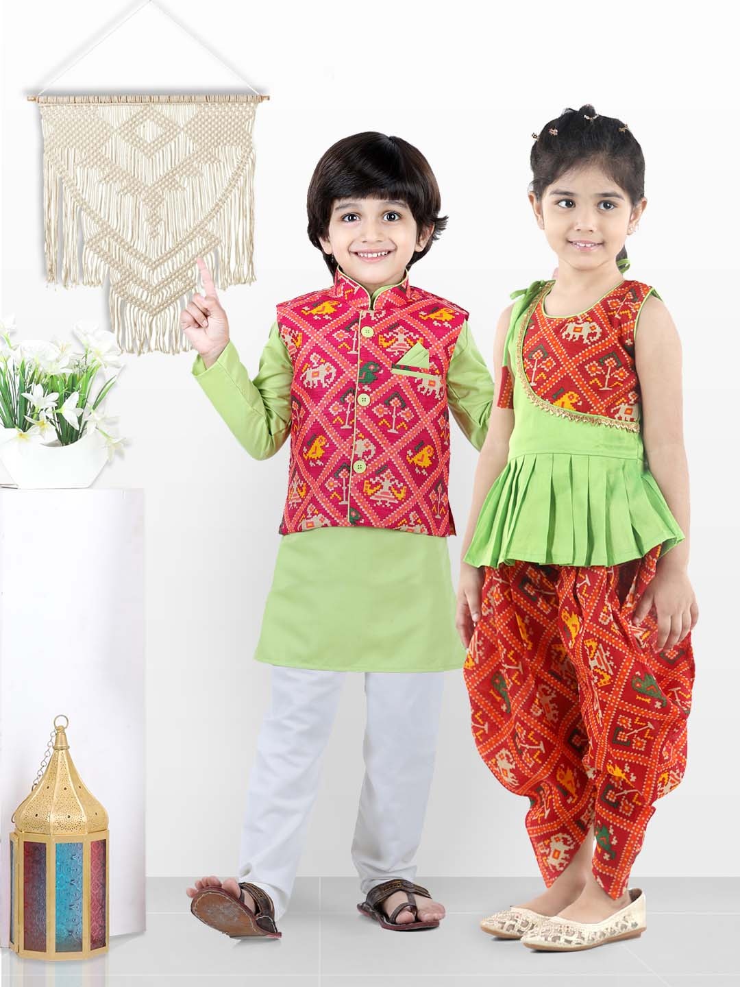 

BownBee Girls Green Ethnic Motifs Printed Pleated Patola Patch Kurti with Dhoti Pants