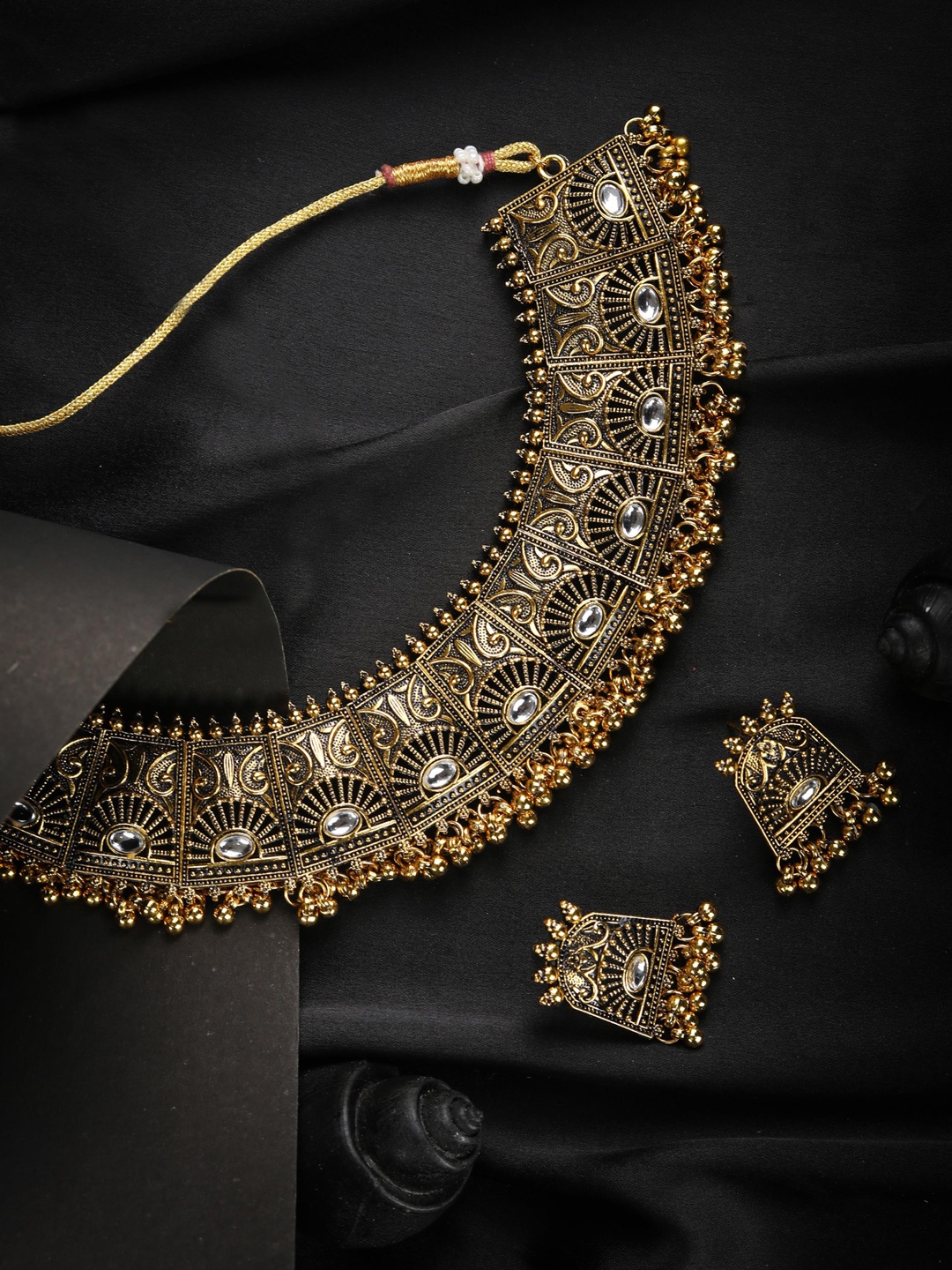 

Priyaasi Oxidised Gold-Plated White Kundan-Studded & Beaded Handcrafted Jewellery Set