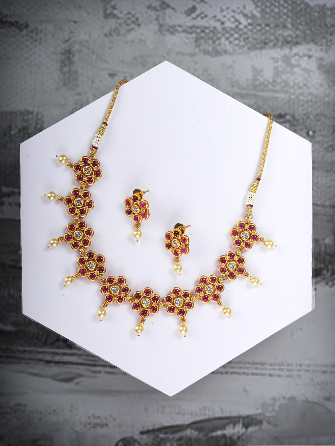 

Priyaasi Gold-Plated Red & White Ruby Stone Studded Jewellery Set