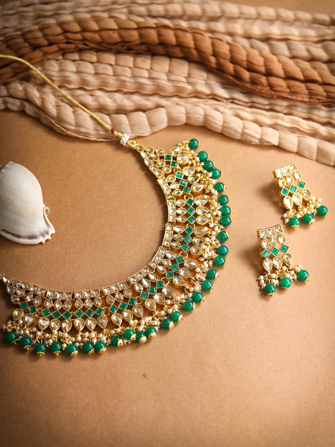 

Priyaasi Gold-Plated Off-White & Green Kundan-Studded & Pearl Beaded Handcrafted Jewellery Set