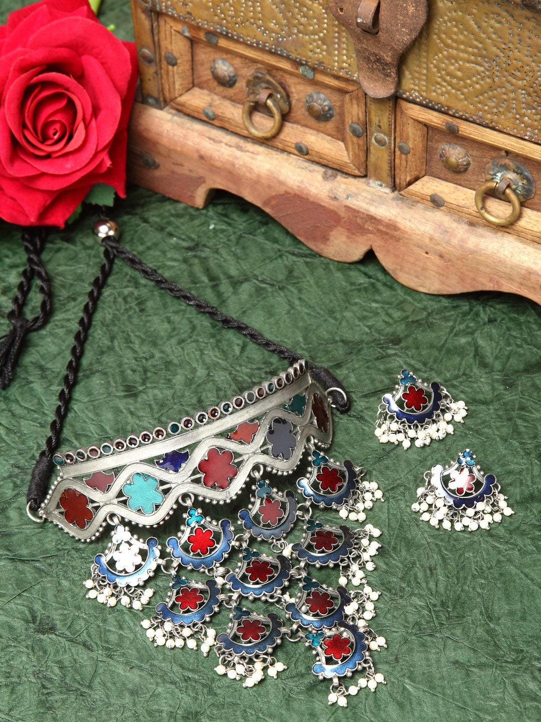 

Moedbuille Oxidized Silver-Plated & Green Afghan Tribal Design Meenakari Jewellery Set