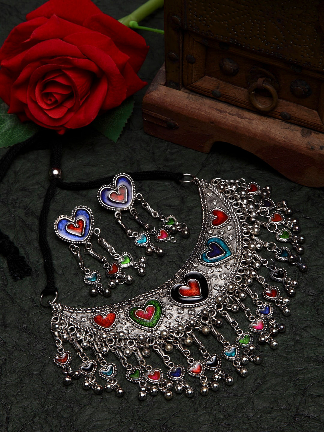 

Moedbuille Silver Meenakari Work Afghan Tasselled Oxidised Handcrafted Jewellery Set