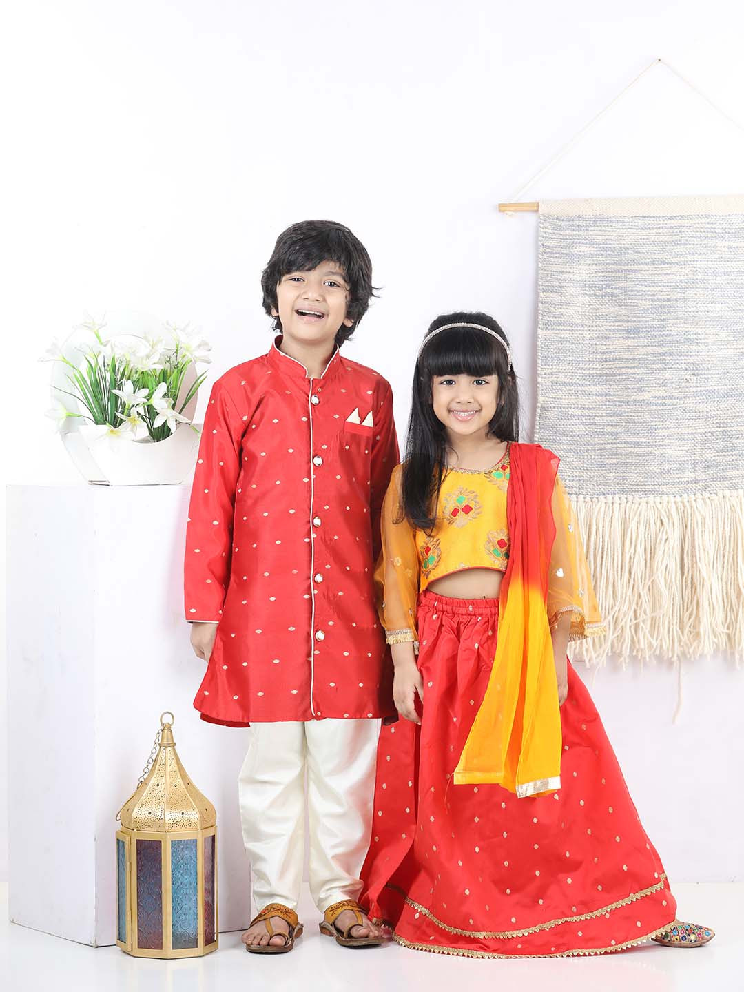 

BownBee Girls Yellow & Red Embellished Sequinned Lehenga & Choli With Dupatta