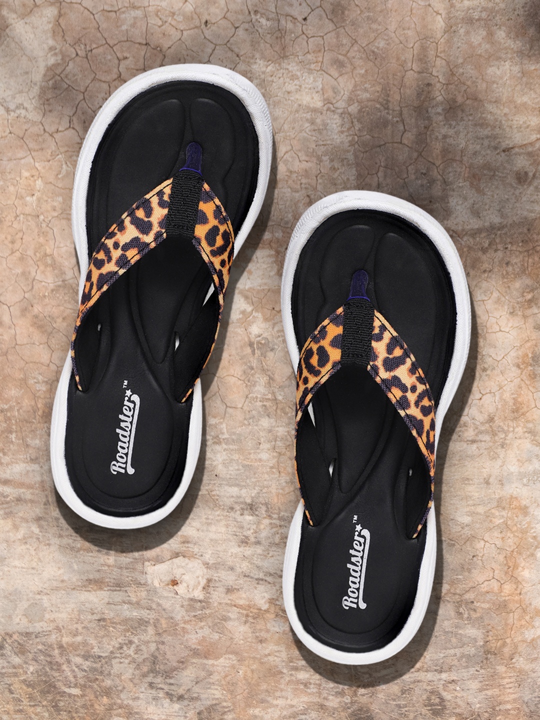 

The Roadster Lifestyle Co Women Yellow & Navy Blue Leopard Printed Thong Flip-Flops
