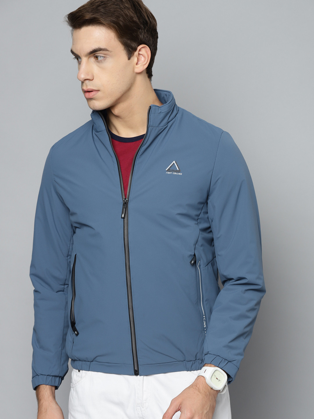 

Fort Collins Men Blue Solid Lightweight Sporty Jacket