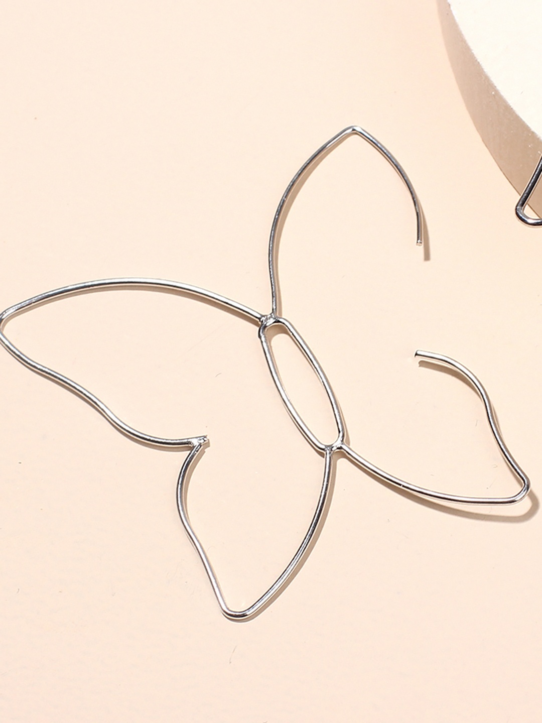 

URBANIC Silver-Toned Butterfly Shaped Drop Earrings