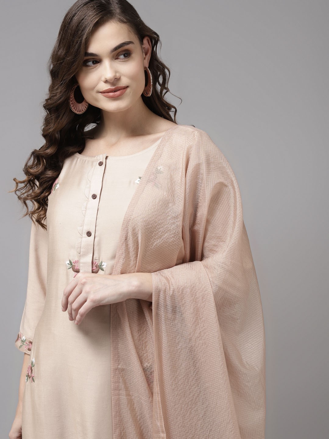 

Indo Era Women Beige Floral Embroidered Regular Kurta with Palazzos & With Dupatta