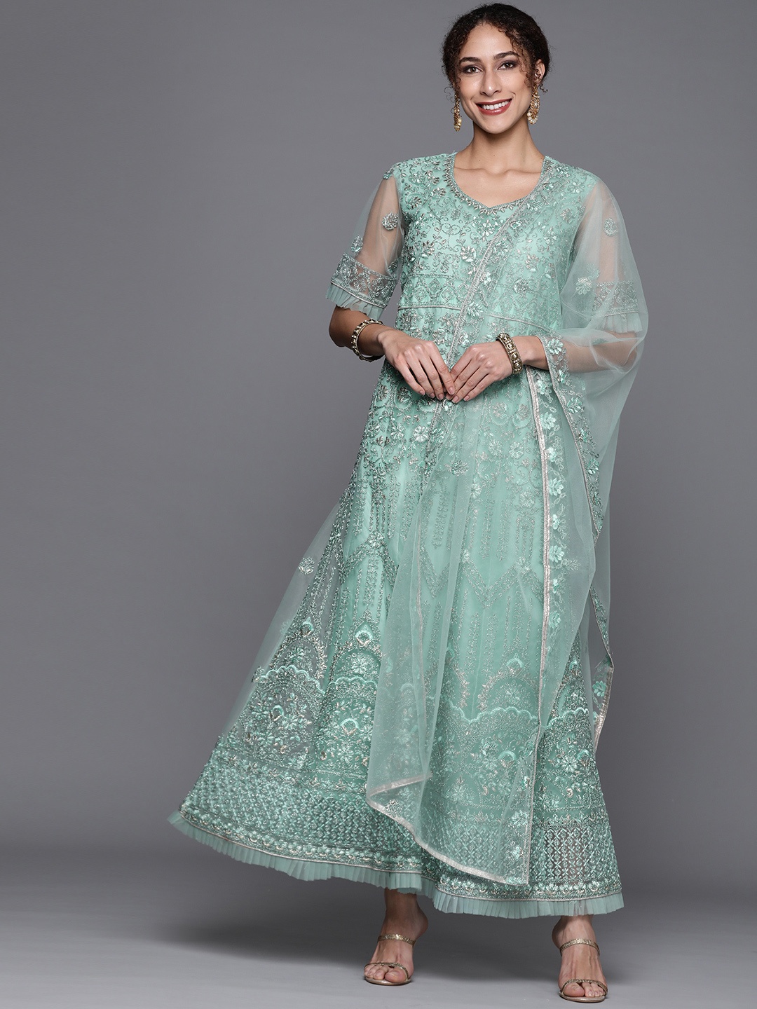 

Chhabra 555 Turquoise Blue Embroidered Semi-Stitched Dress Material