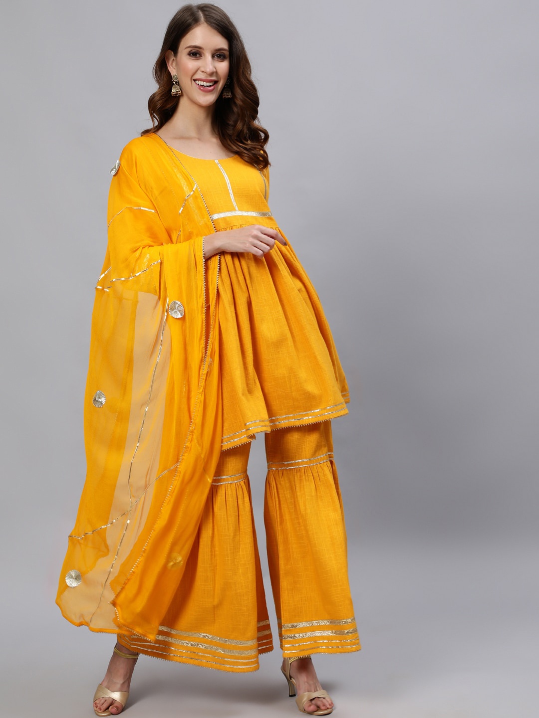 

Jaipur Kurti Women Mustard Yellow Pleated Pure Cotton Kurta With Sharara & Dupatta