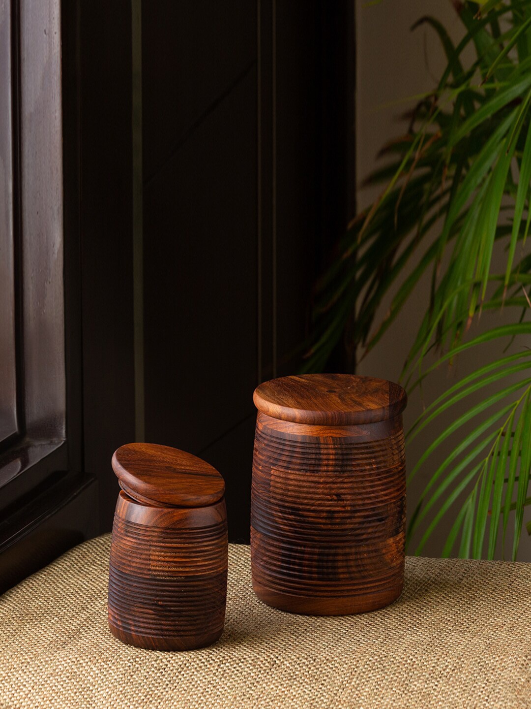 

ExclusiveLane Ripples of Wood Set Of 2 Brown Hand-Carved Wooden Jars With Lids