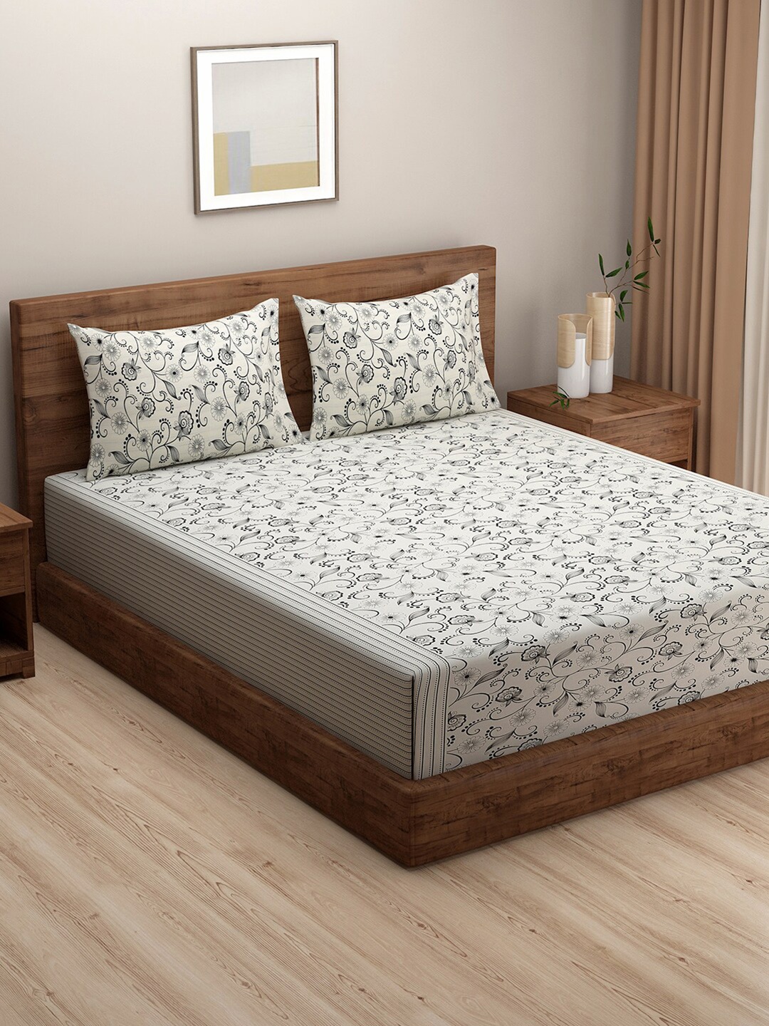 

SWAYAM Off White & Black Floral Printed 144 TC Cotton King Bedsheet with 2 Pillow Covers