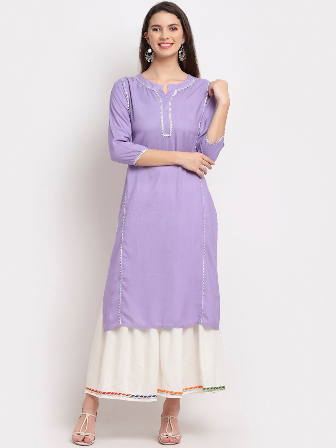 

Rudra Bazaar Women Lavender & White Regular Kurta with Palazzos