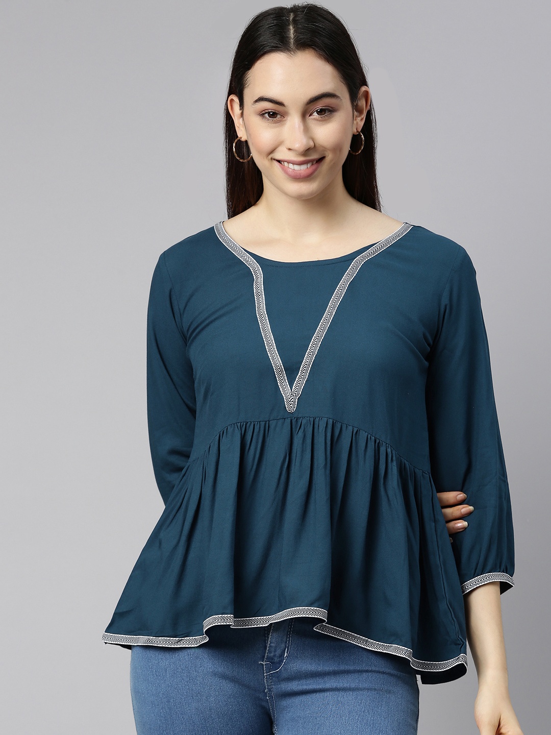 

Selvia Teal Peplum Top