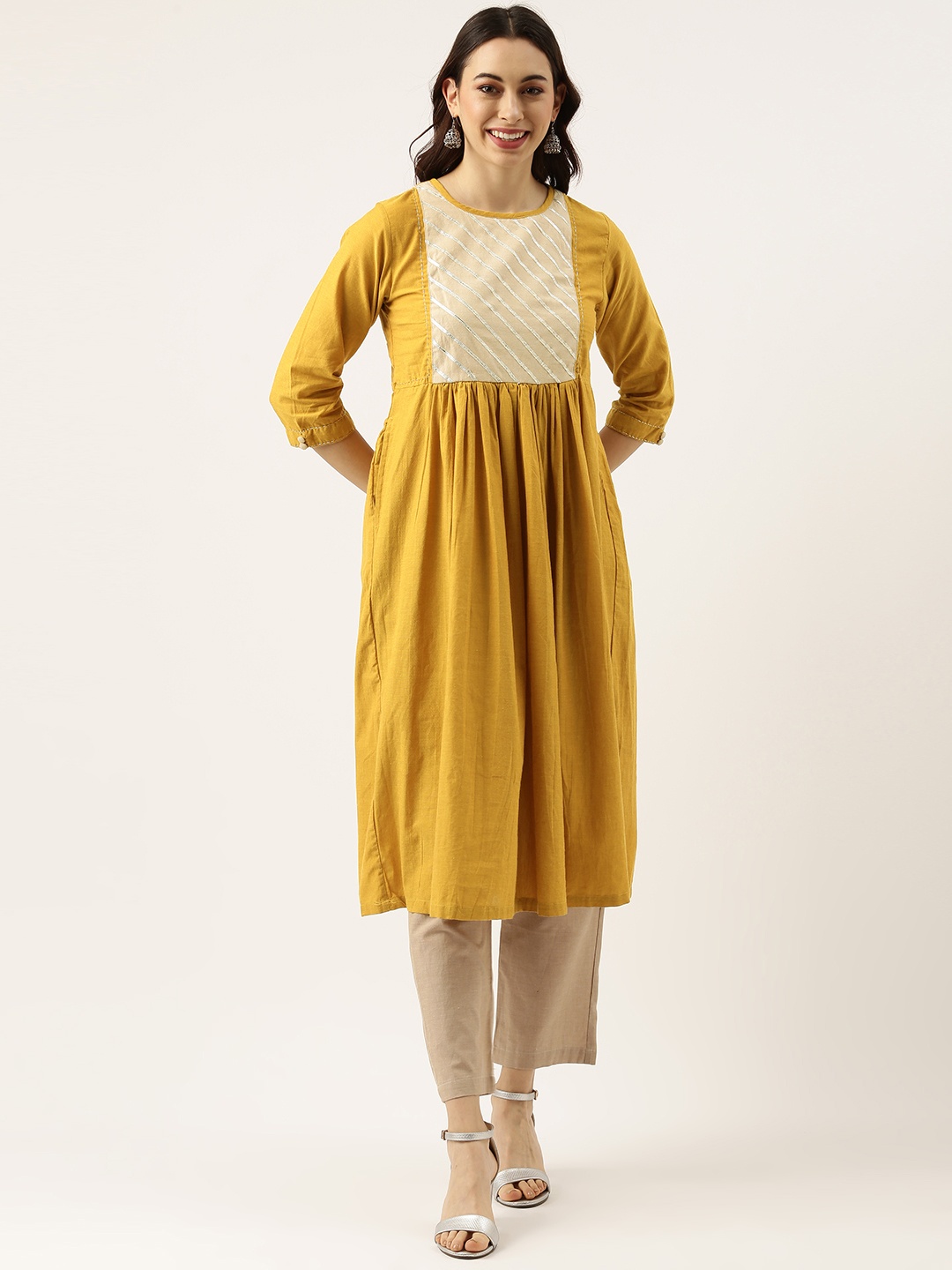 

Lokatita Women Mustard Yellow & Beige Embroidered Gotta Patti Pure Cotton Kurta