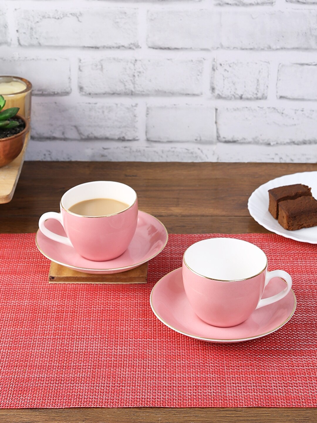 

HomeTown Pink & White Solid Ceramic Glossy Cups and Saucers Set of Cups and Mugs