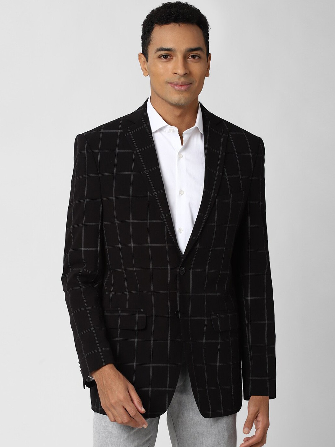 

Peter England Elite Men Black Checked Single Breasted Blazer