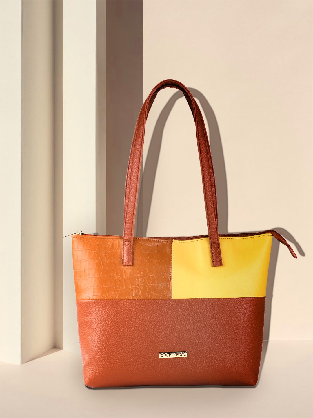 

Caprese Tan Brown & Yellow Colourblocked Structured Shoulder Bag with Croc Textured Detail