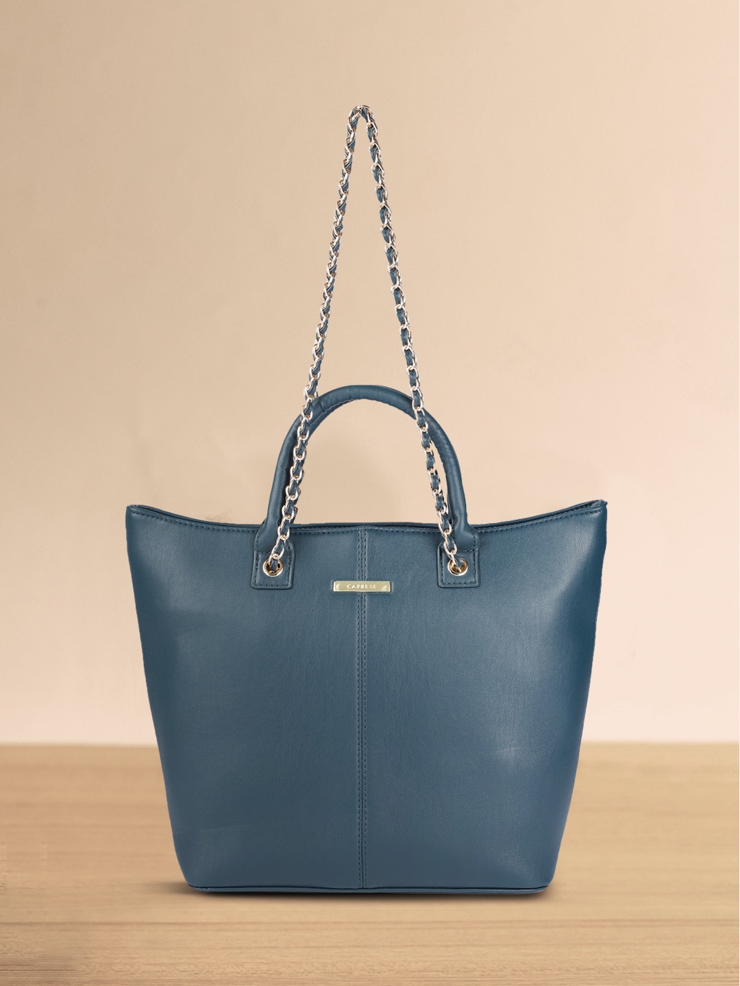 

Caprese Teal Blue Solid Handheld Bag