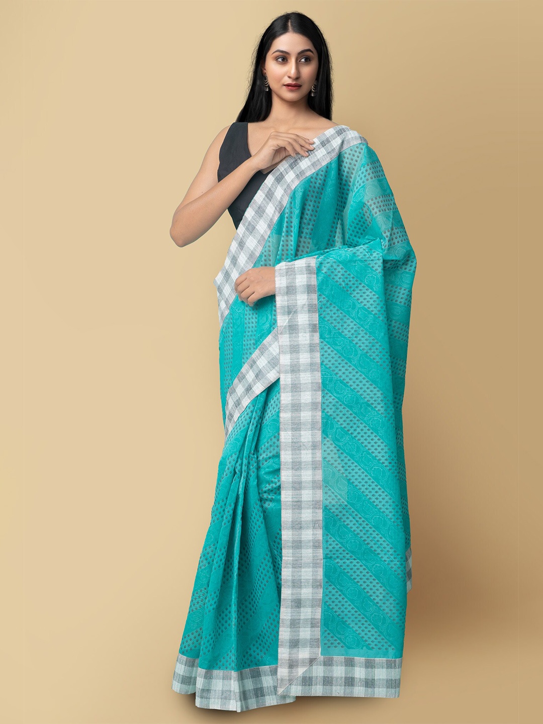 

Unnati Silks Women Sea Green & White Chanderi Art Silk Saree