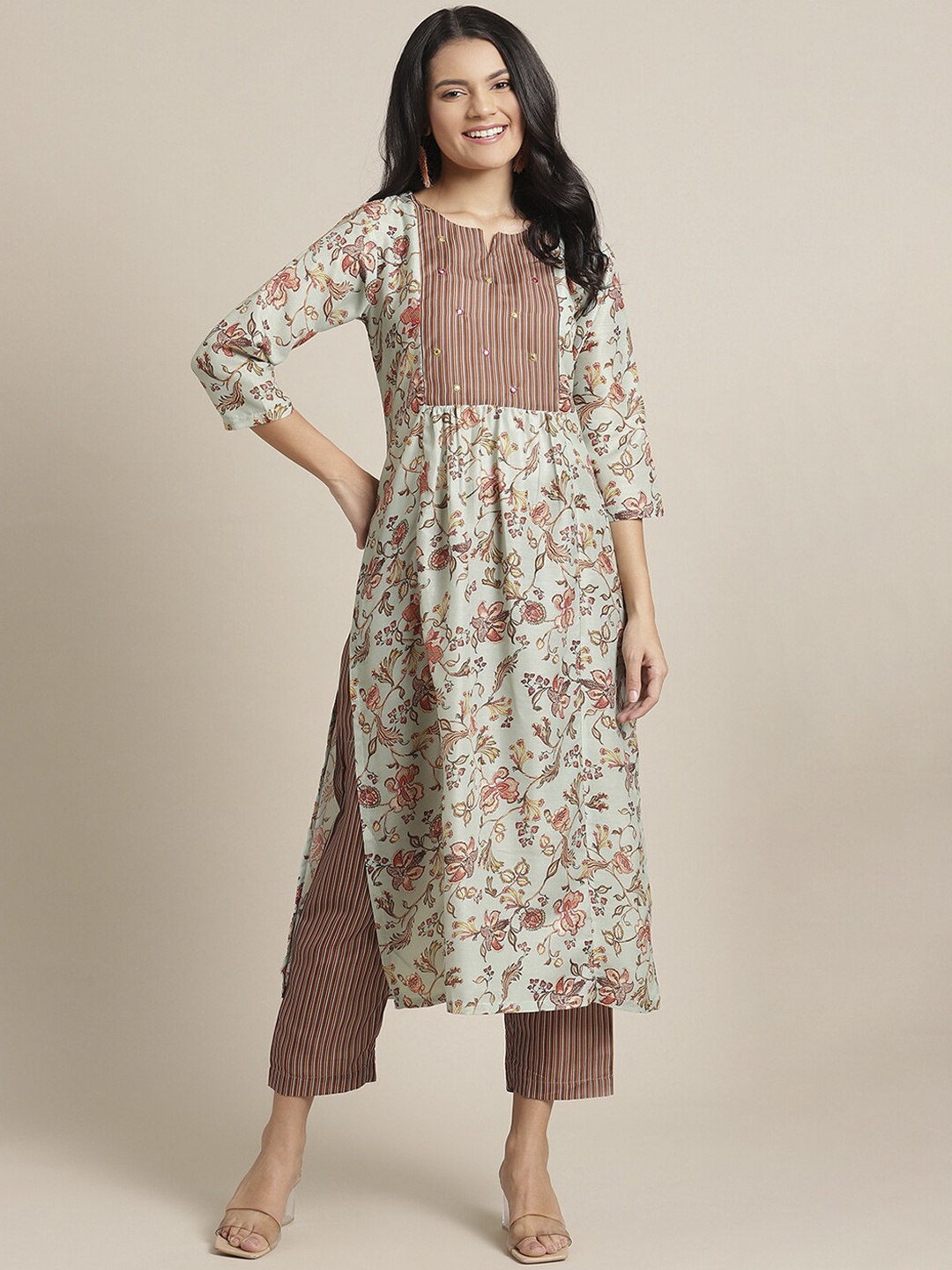 

Varanga Women Sea Green Floral Yoke Design Regular Kurta with Trousers