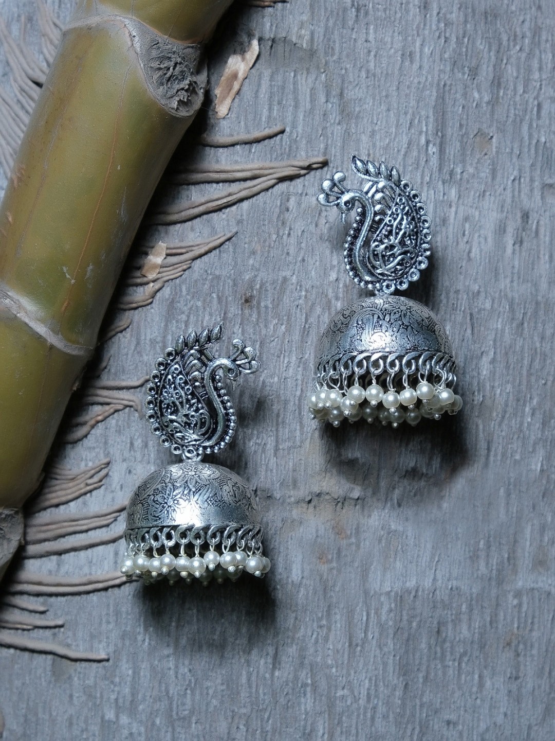 

Crunchy Fashion Silver-Toned Dome Shaped Jhumkas Earrings