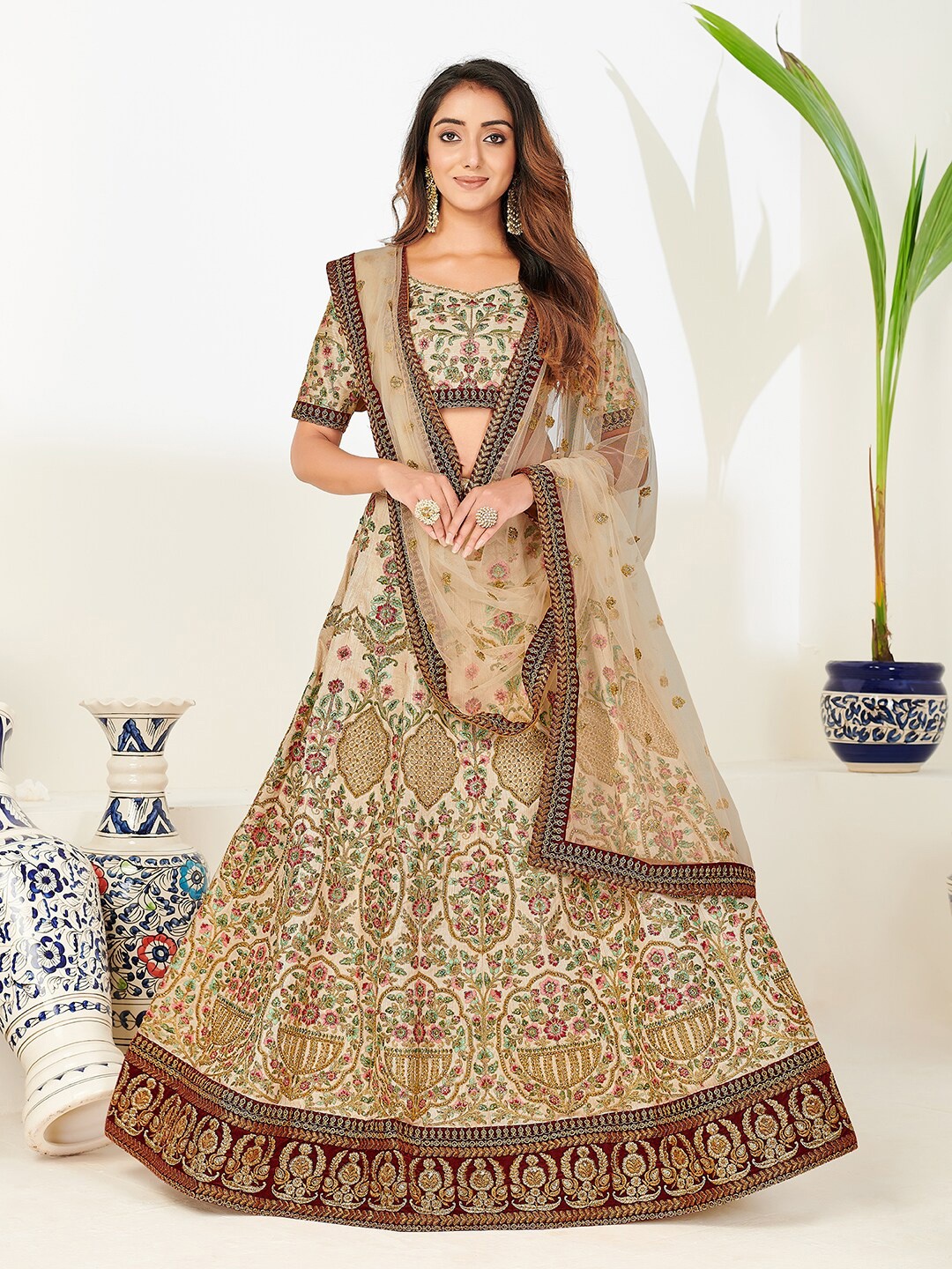 

SHOPGARB Off White & Brown Embroidered Sequinned Foil Print Semi-Stitched Lehenga & Unstitched Blouse With