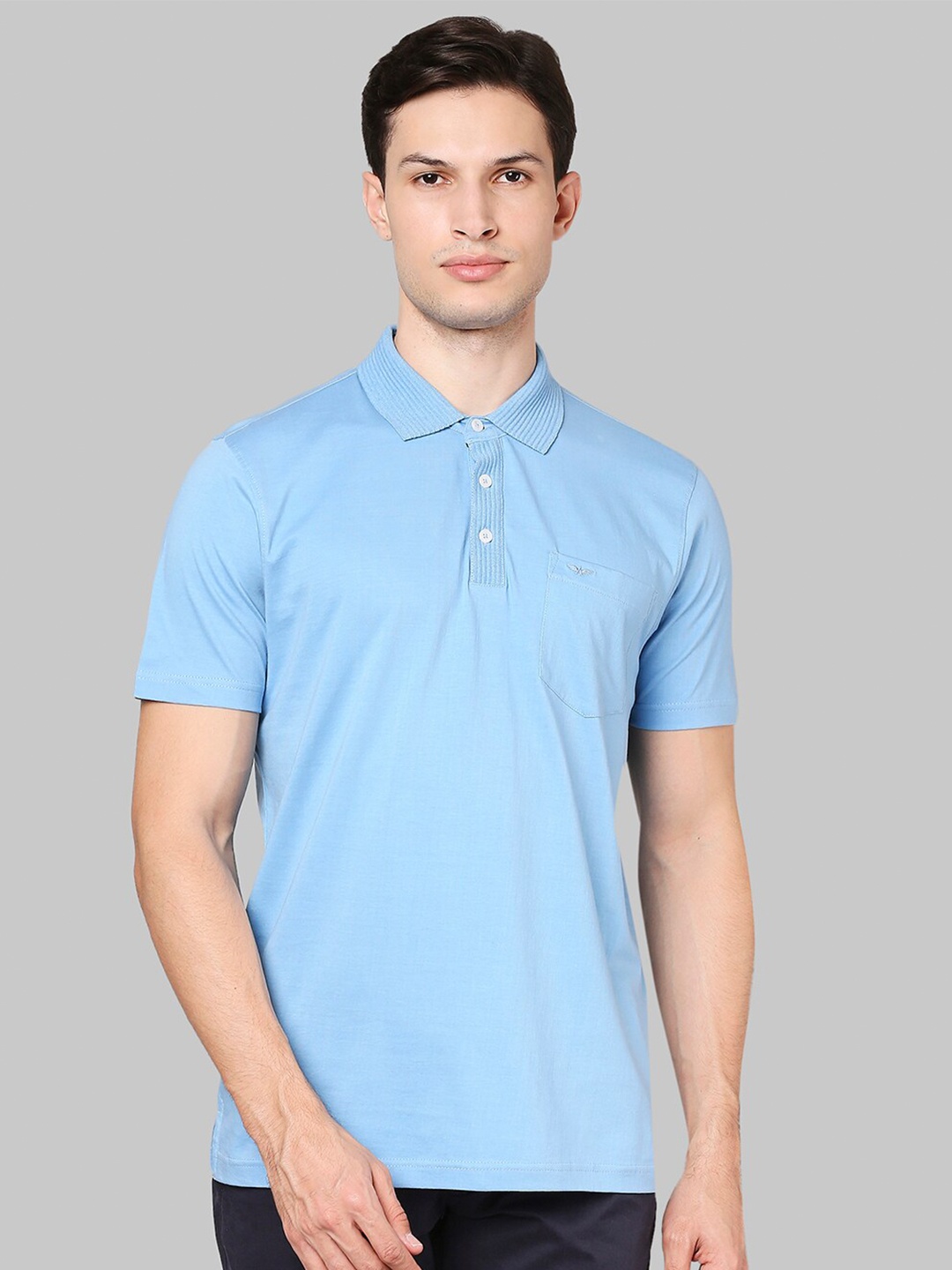 

Park Avenue Men Blue Solid Polo Collar Cotton T-shirt