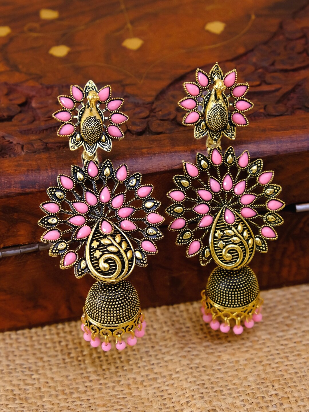 

Crunchy Fashion Pink & Gold-Plated Peacock Shaped Kundan Studded Jhumkas Earrings