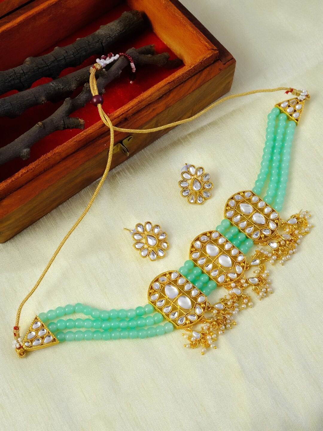 

Crunchy Fashion Gold Plated & Green Kundan Studded & Beaded Meenakari Jewellery Set