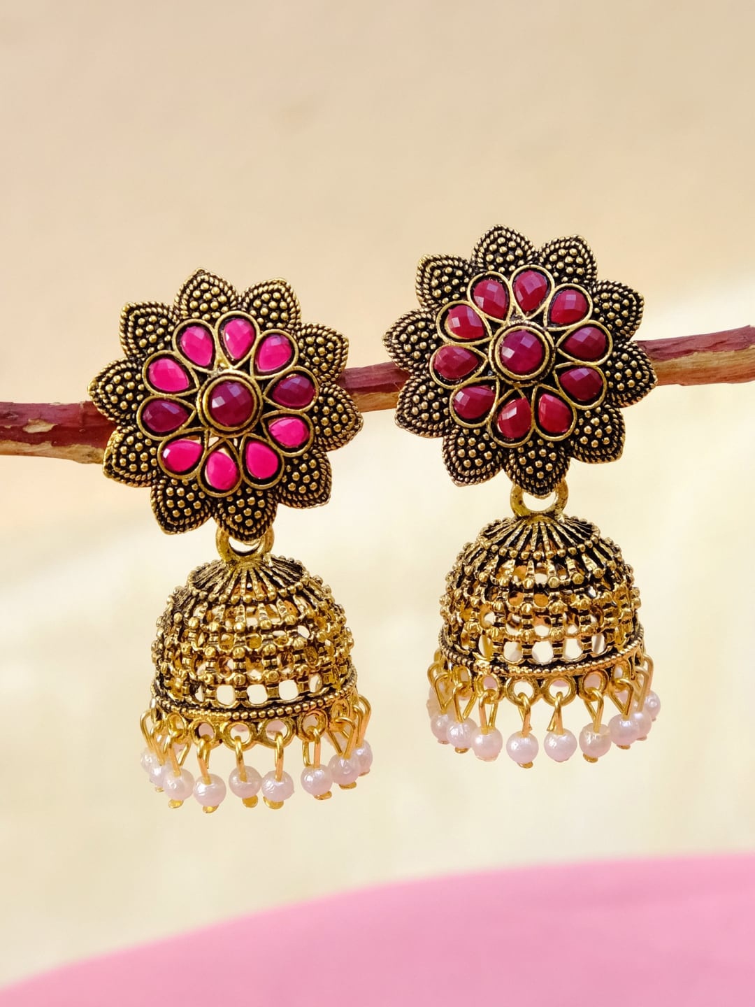 

Crunchy Fashion Pink & Gold-Toned Gold Plated Star Shaped Jhumkas Earrings