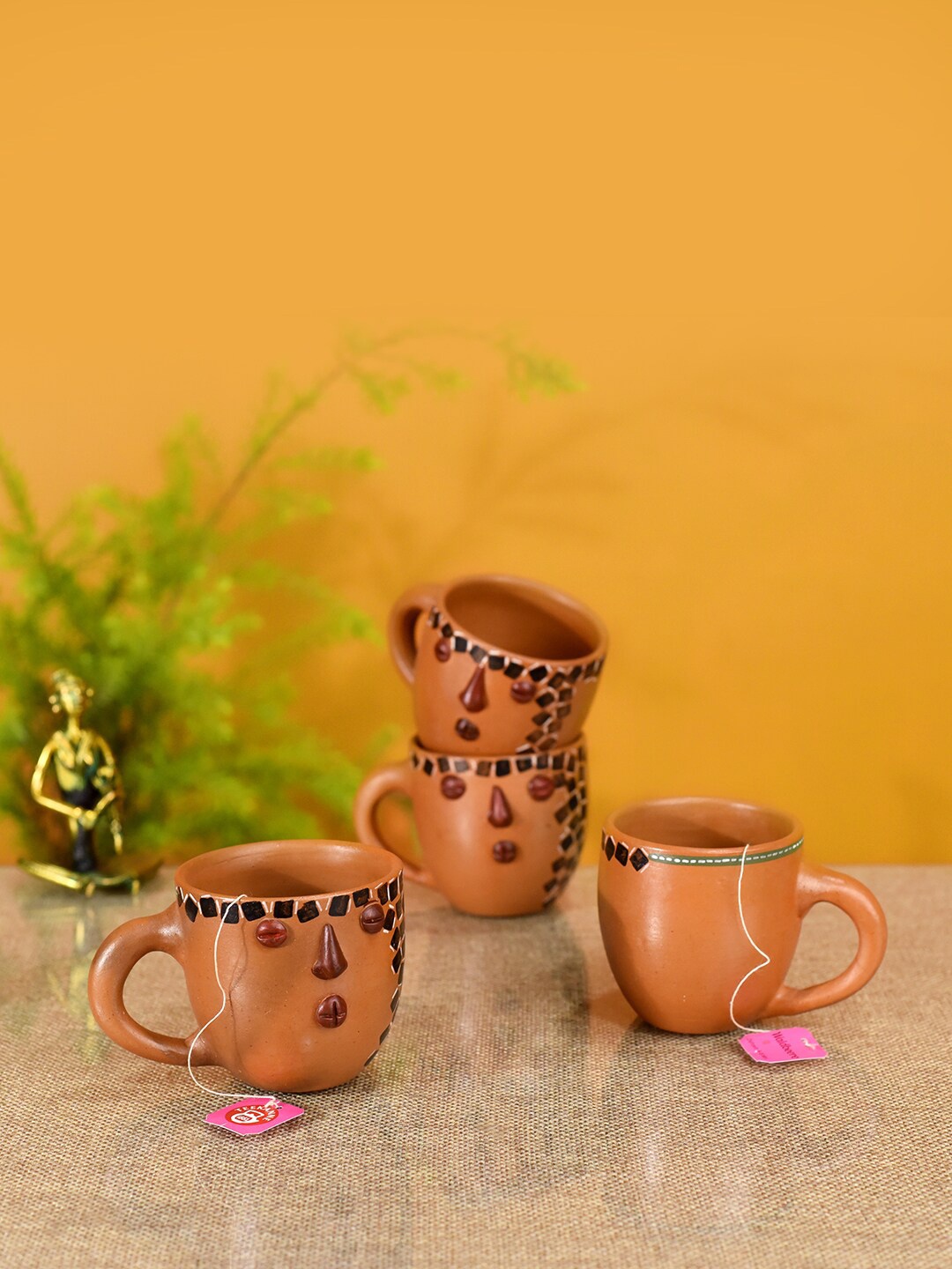 

AAKRITI ART CREATIONS Set of 4 Beige & Brown Printed Terracotta Matte Cups and Mugs