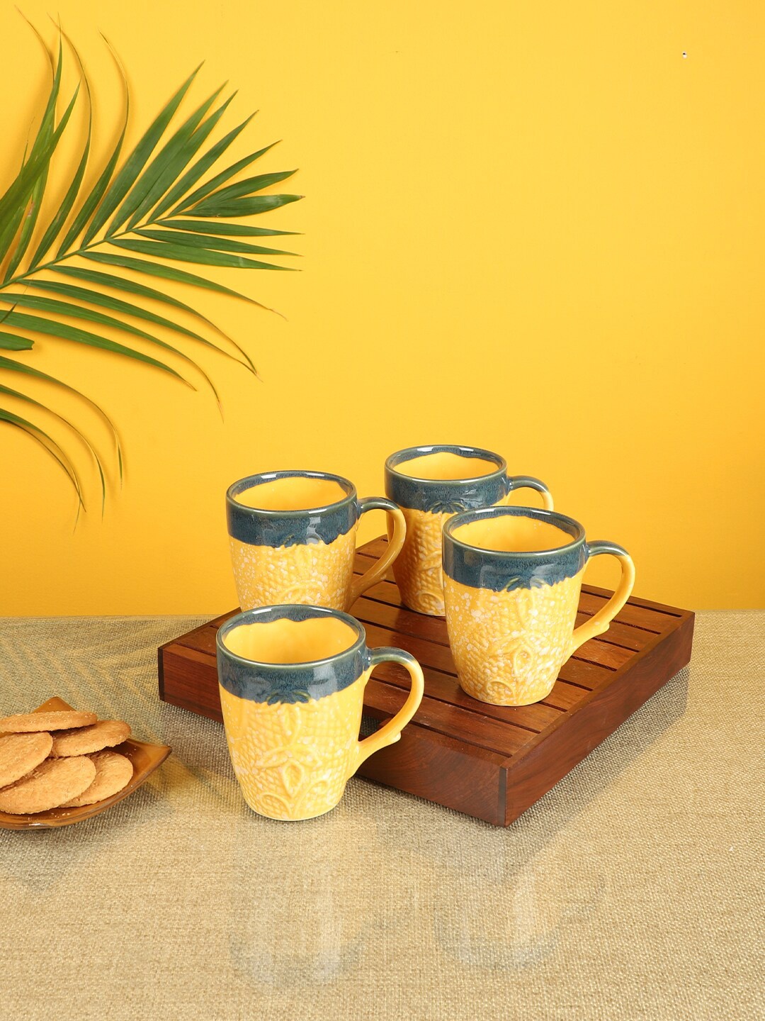 

AAKRITI ART CREATIONS Set Of 4 Black & Yellow Ceramic Textured Mugs