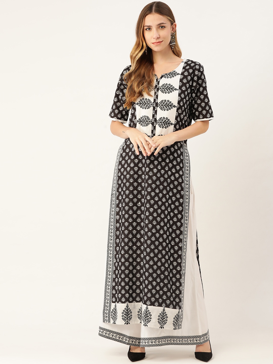 

Magnetic Designs Women Black Floral Printed Regular Pure Cotton Kurta with Palazzos