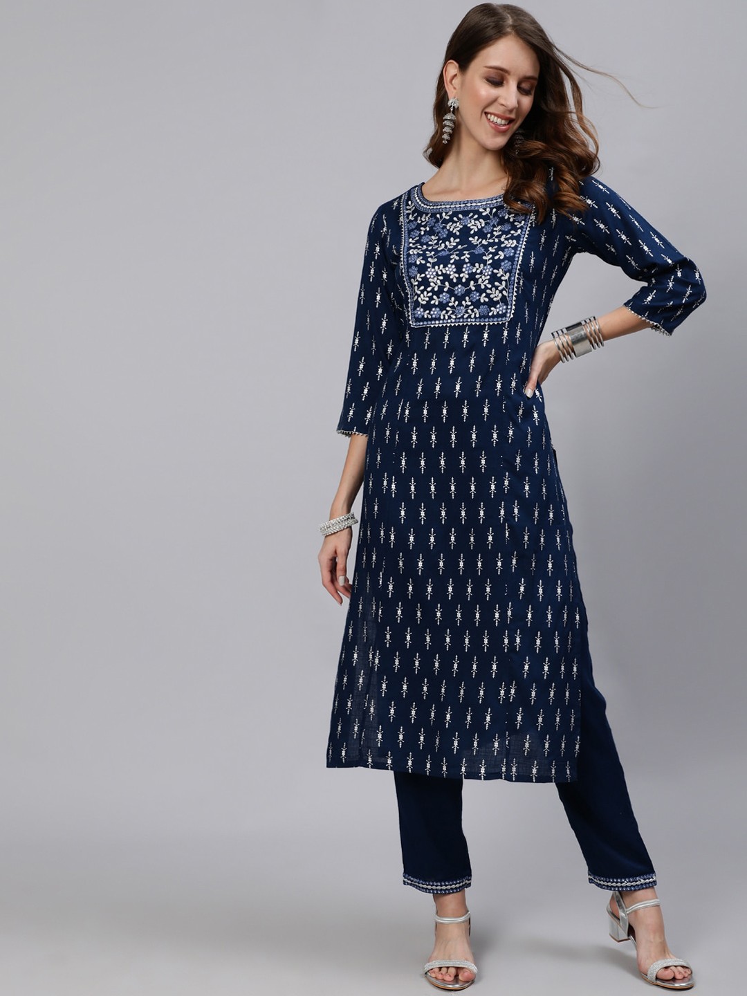 

Anubhutee Women Navy Blue Ethnic Motifs Yoke Design Regular Kurta with Trousers