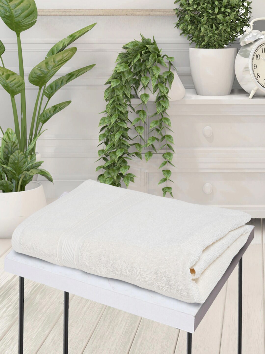 

Creeva Cream-Coloured Solid 500 GSM Cotton Bath Towel