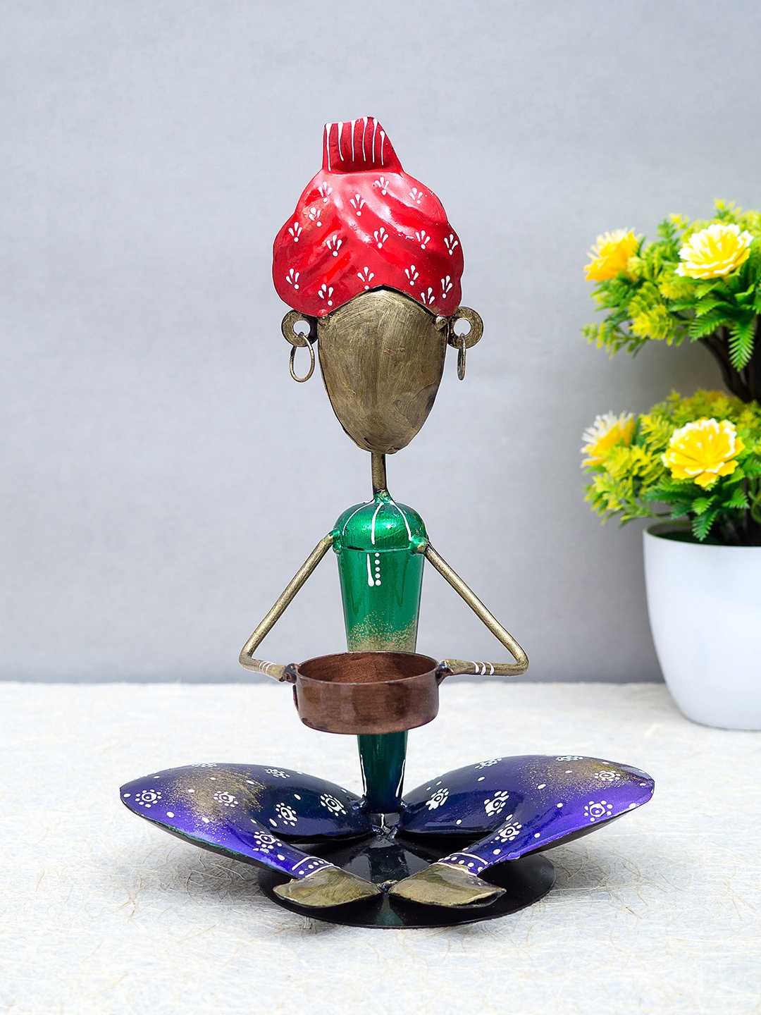 

Golden Peacock Green & Red Metal Handcrafted Sitting Turban Man Figurine Showpieces