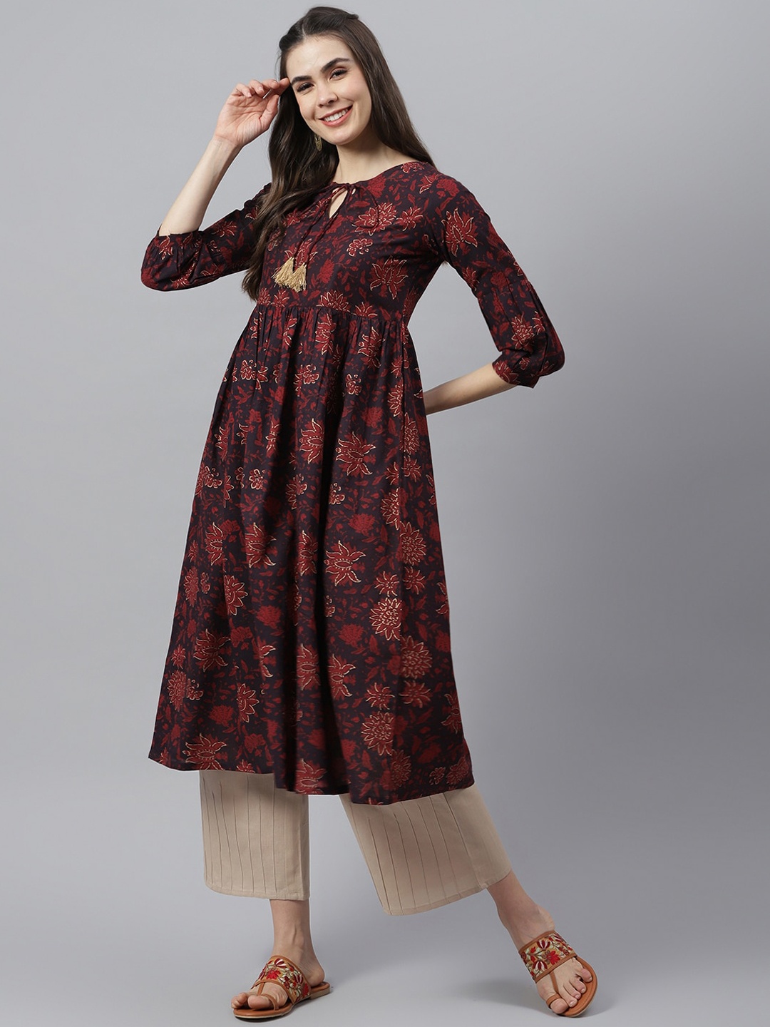 

Stylum Women Brown Printed Cotton Flared Kurta