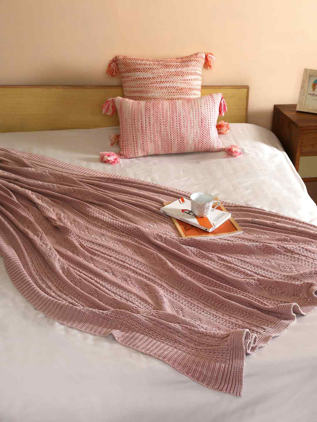 

Amoliconcepts Pink Self Design Knitted Throw