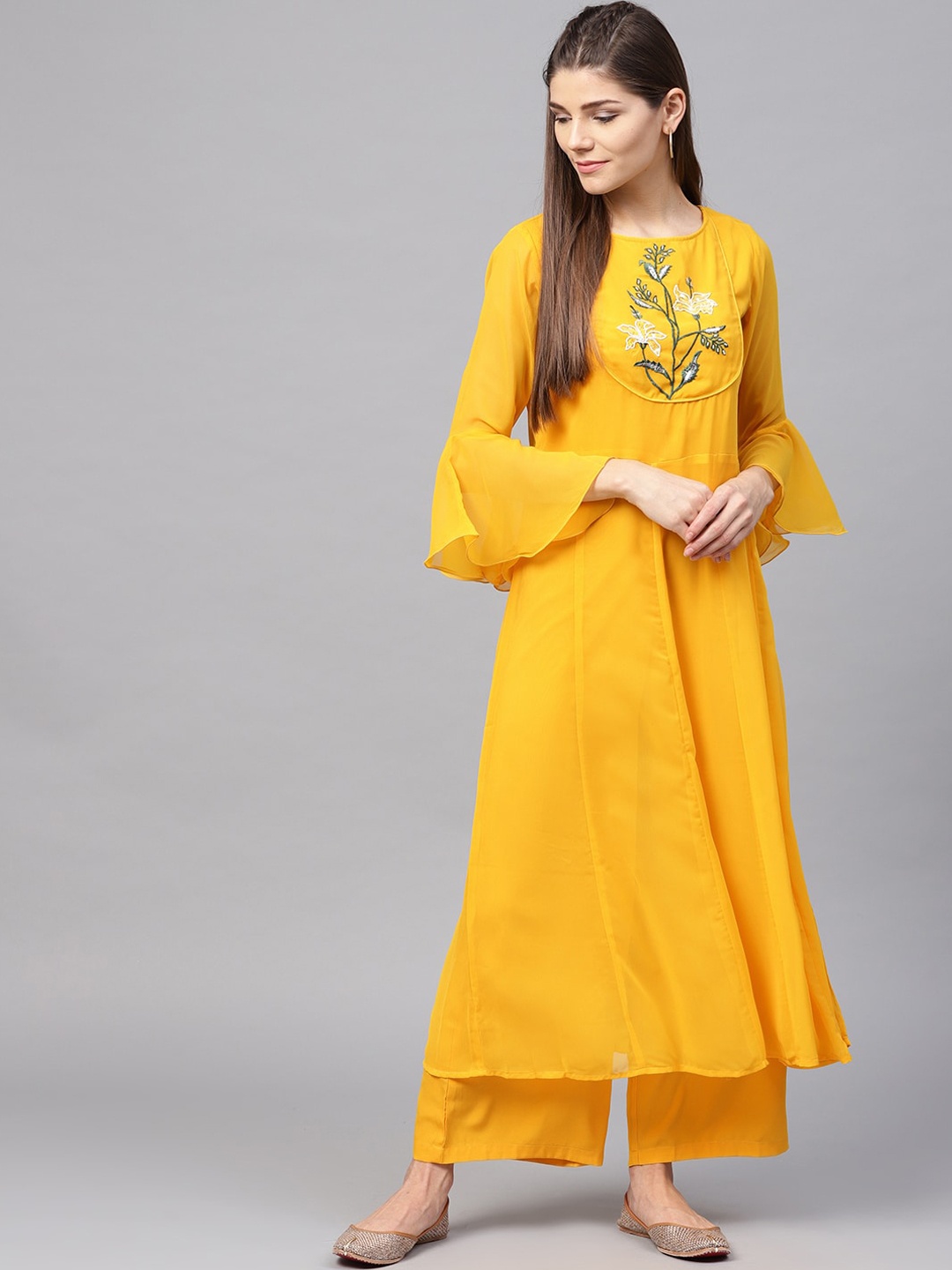 

Bitterlime Women Yellow Floral Embroidered Panelled Kurta with Palazzos