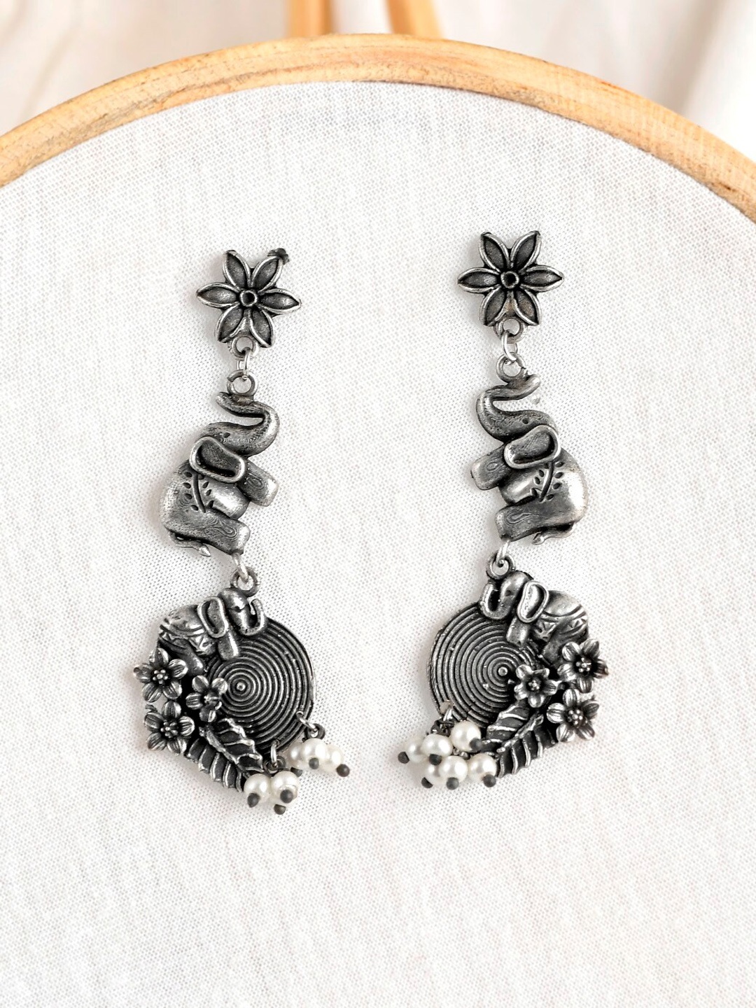 

Infuzze Silver-Toned Contemporary Jhumkas Earrings