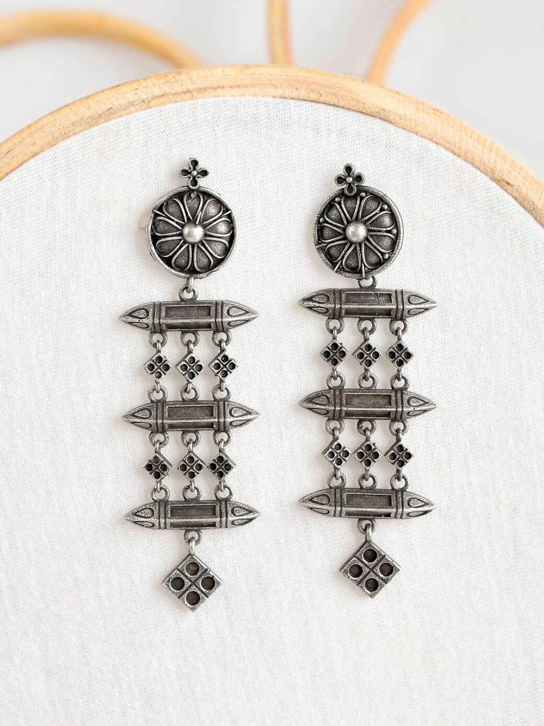 

Infuzze Silver-Toned Contemporary Studs Earrings