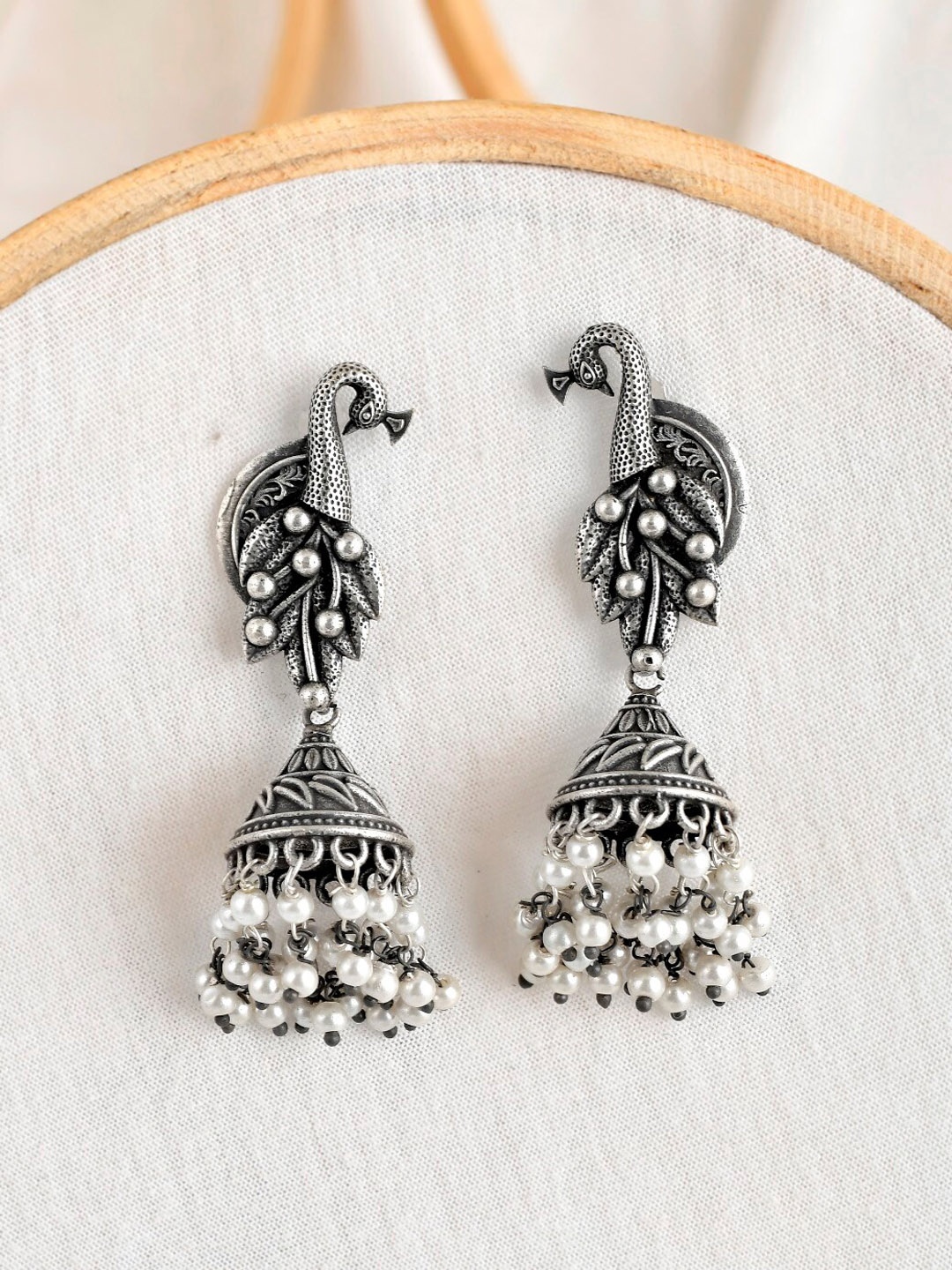 

Infuzze Silver-Toned Contemporary Jhumkas Earrings