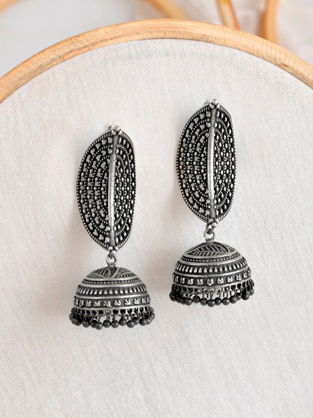 

Infuzze Silver-Toned Dome Shaped Jhumkas Earrings