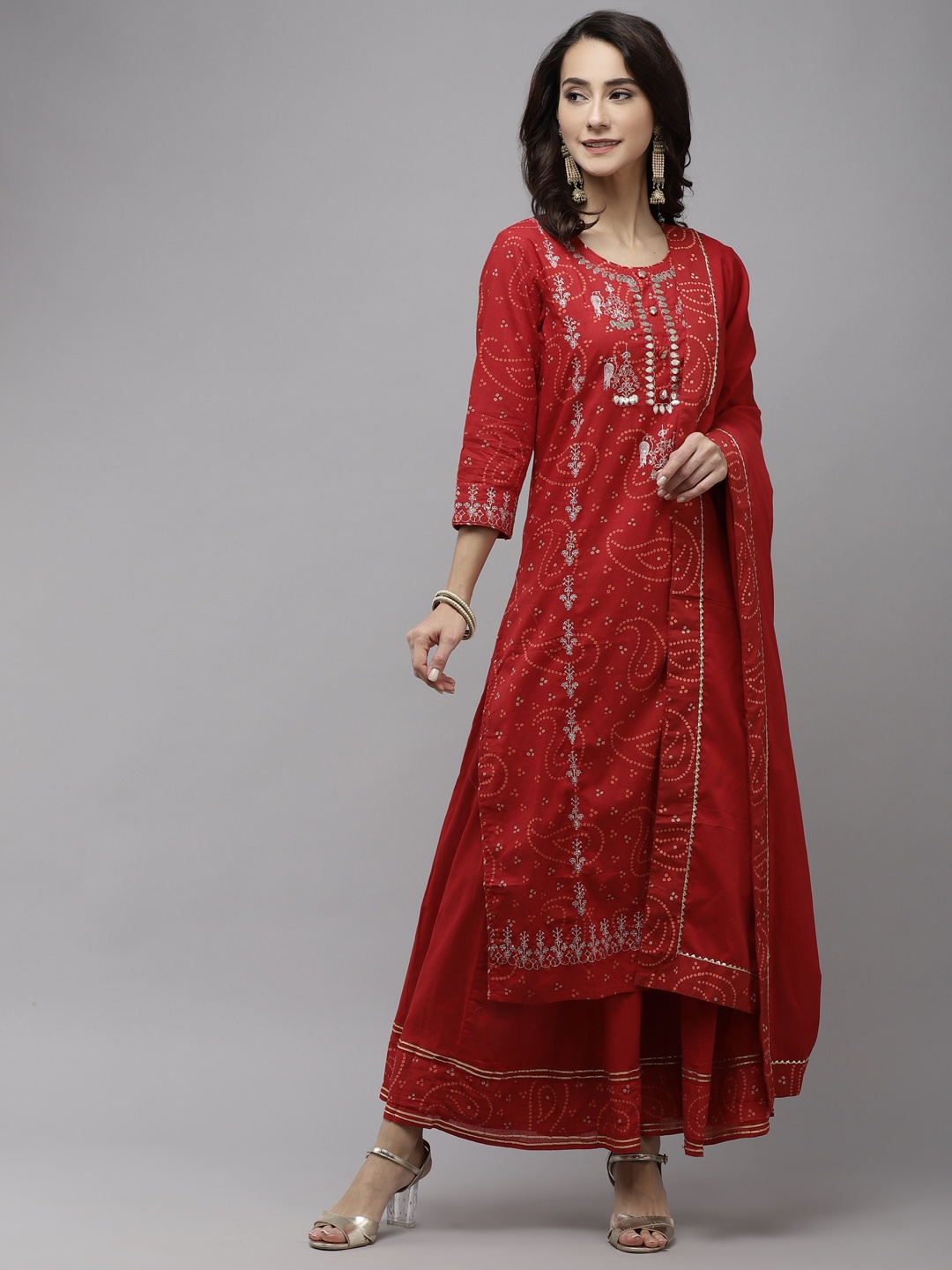 

Ishin Women Red Bandhani Embroidered Regular Gotta Patti Pure Cotton Kurta with Sharara & With Dupatta