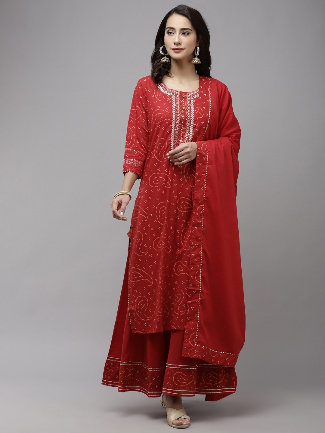 

Ishin Women Red Paisley Embroidered Regular Sequinned Pure Cotton Kurta with Sharara & With Dupatta