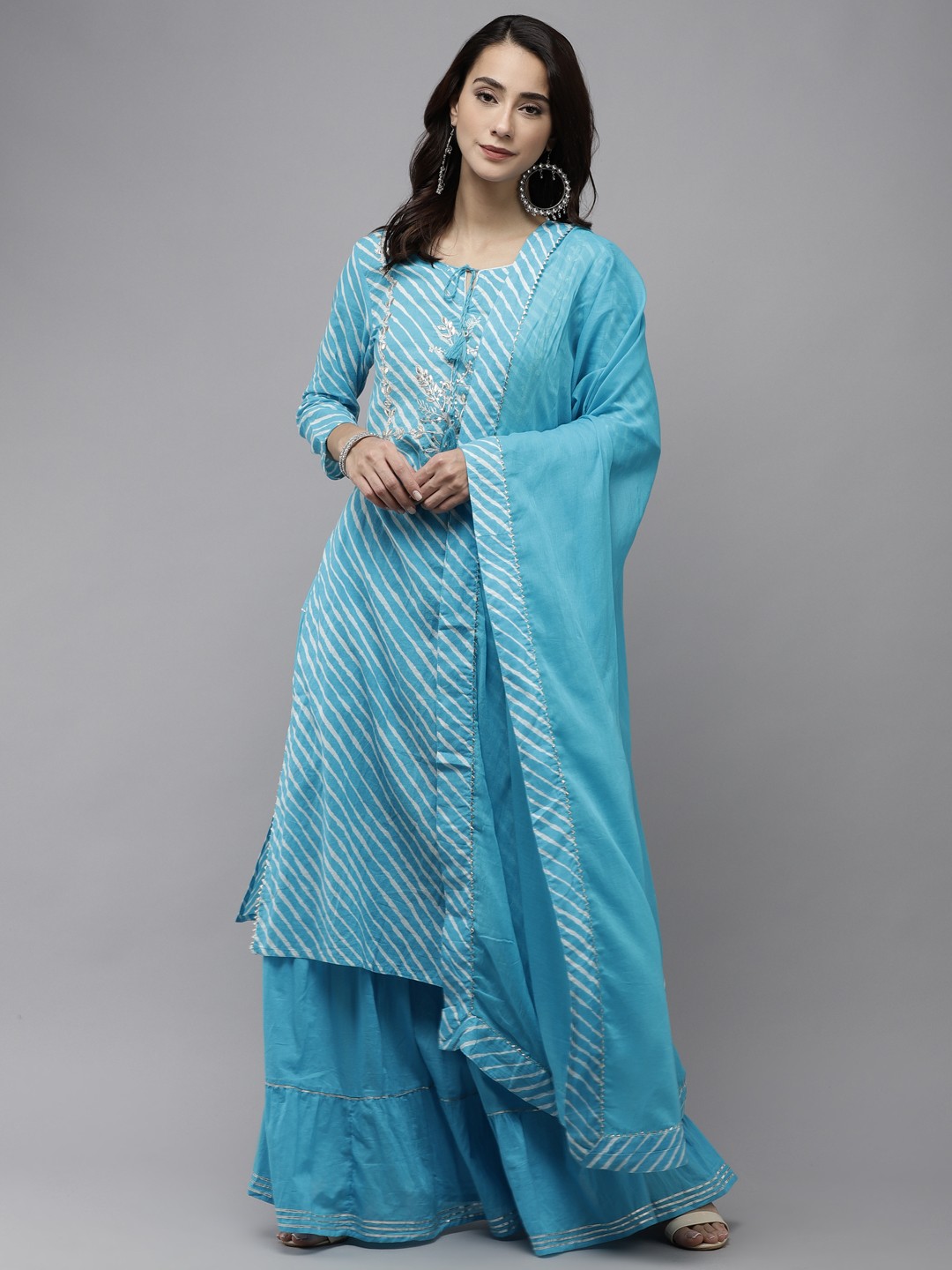 

Ishin Women Blue Leheriya Embroidered Regular Sequinned Pure Cotton Kurta with Skirt & With Dupatta