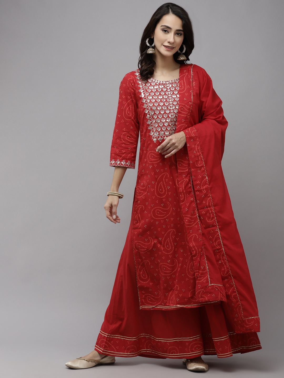 

Ishin Women Red Bandhani Embroidered Regular Pure Cotton Kurta with Sharara & With Dupatta