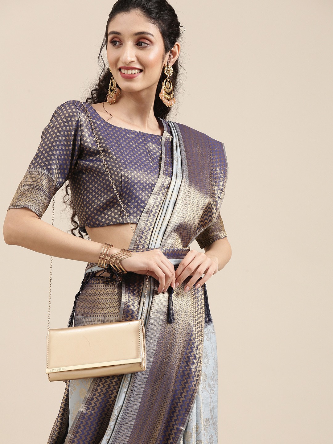 

Saree mall Blue Ethnic Motifs Zari Silk Blend Banarasi Sarees